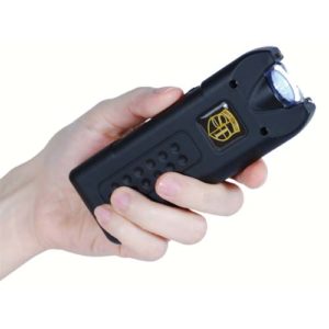 black multiguard stun gun in womans hand
